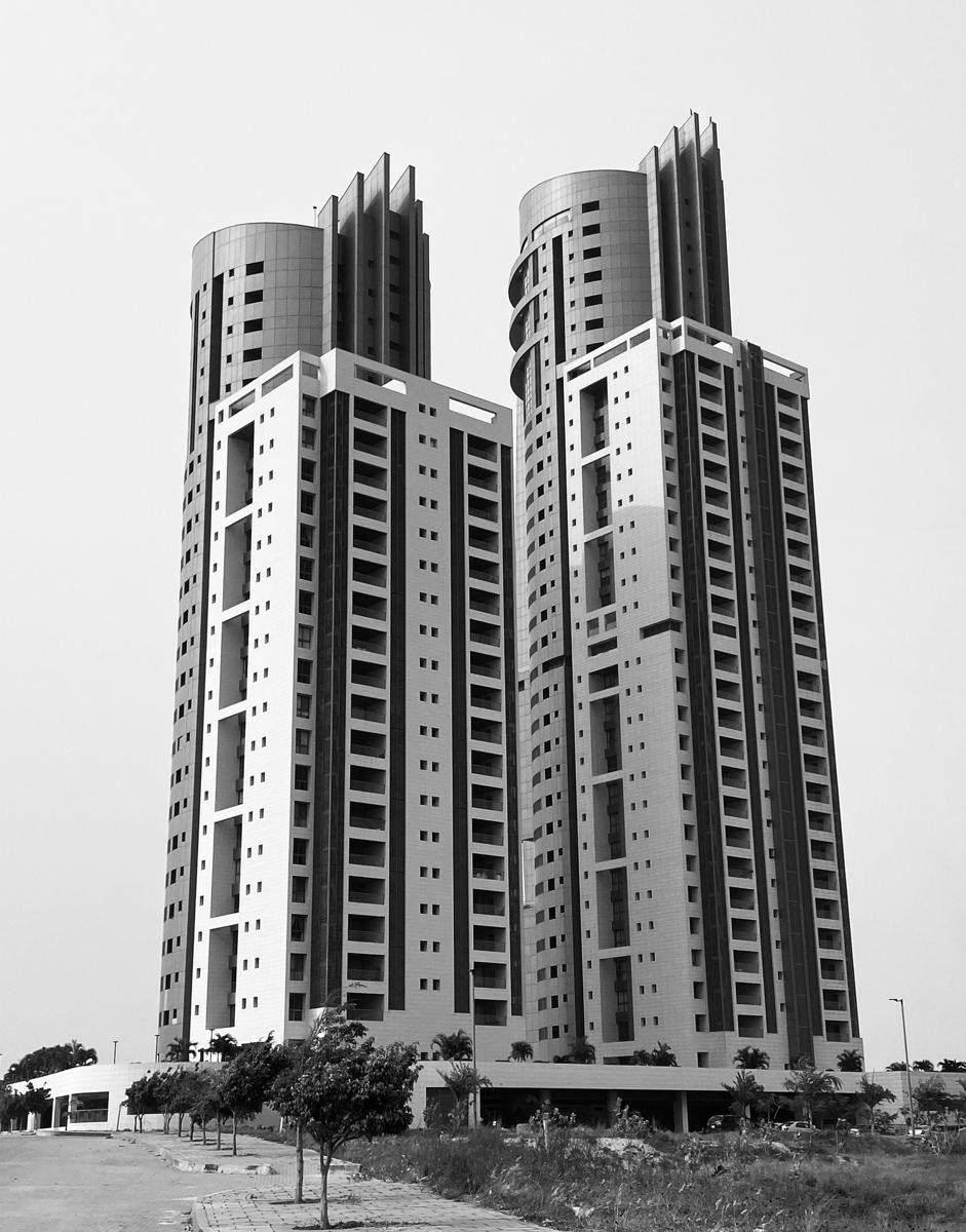 Black and white photo of two residential towers in Lagos